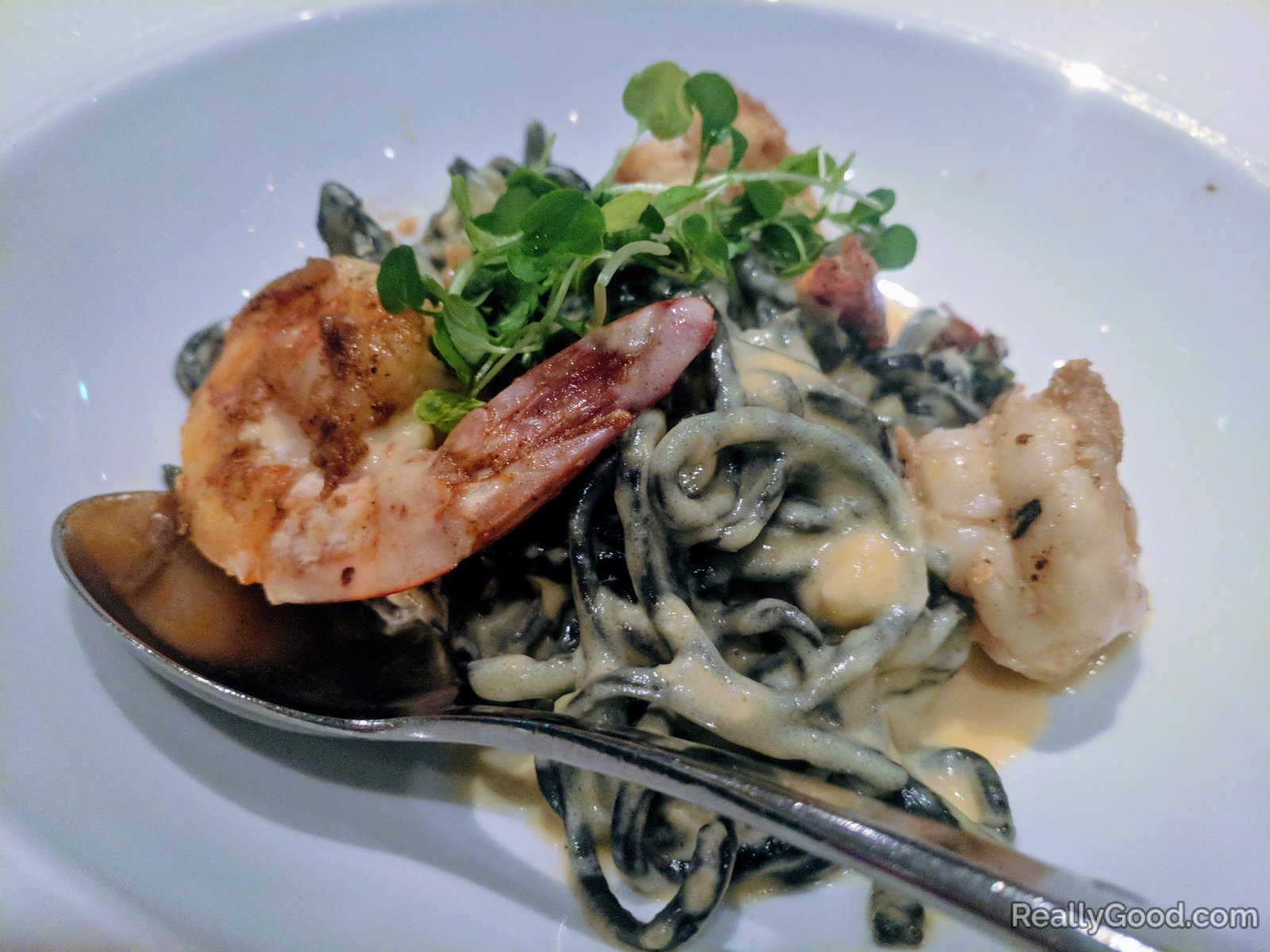 Shrimp on squid ink pasta